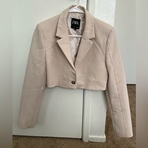 Zara Black Logo Label on Cream Fabric